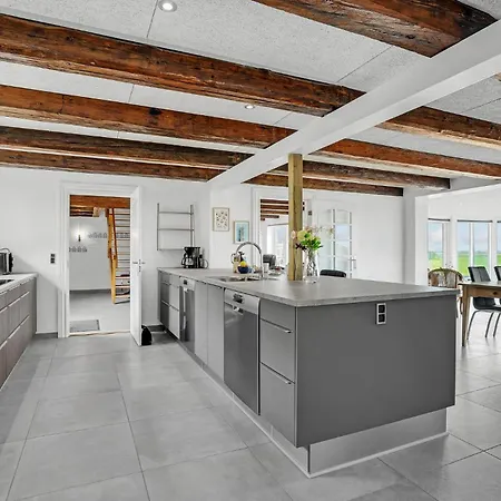 In Tim With House A Panoramic View * Halkaer